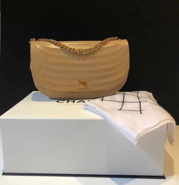 CHANEL Vintage Half Moon Shoulder Bag Beige Quilted Leather Gold Hardware 1980s