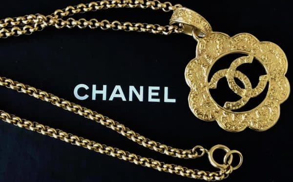 Vintage CHANEL Cutout Logo Flower Necklace