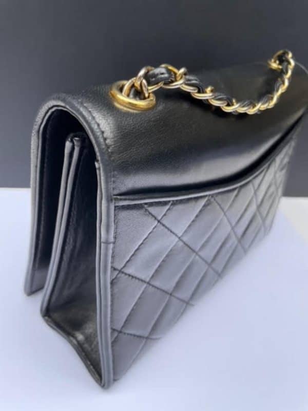 chanel vintage cc logo quilted shoulder flap bag black timeless c.1989 1991