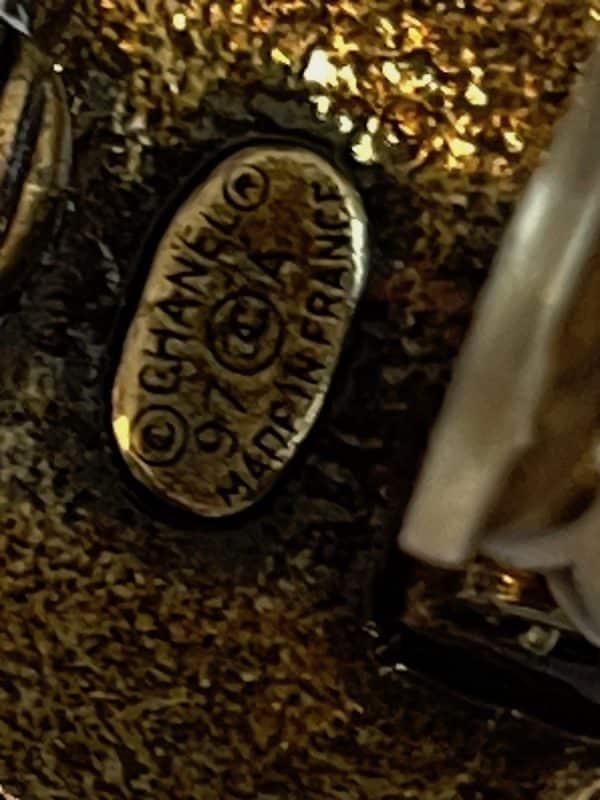 chanel vintage cc logo earrings clip on button rivet autumn 1997