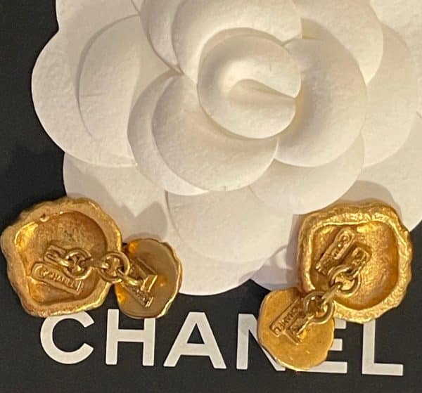 chanel vintage chanel logo cufflinks gold tone 1980s