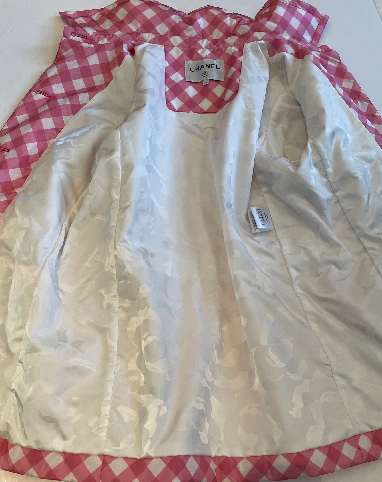 chanel silk pink checkered jacket with chanel cc patches cruise collection 2023